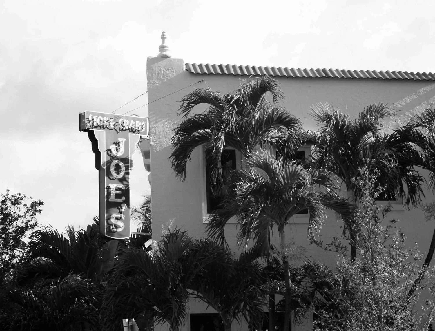 Joe's Stone Crab restaurant exterior, Home of the Crab sign