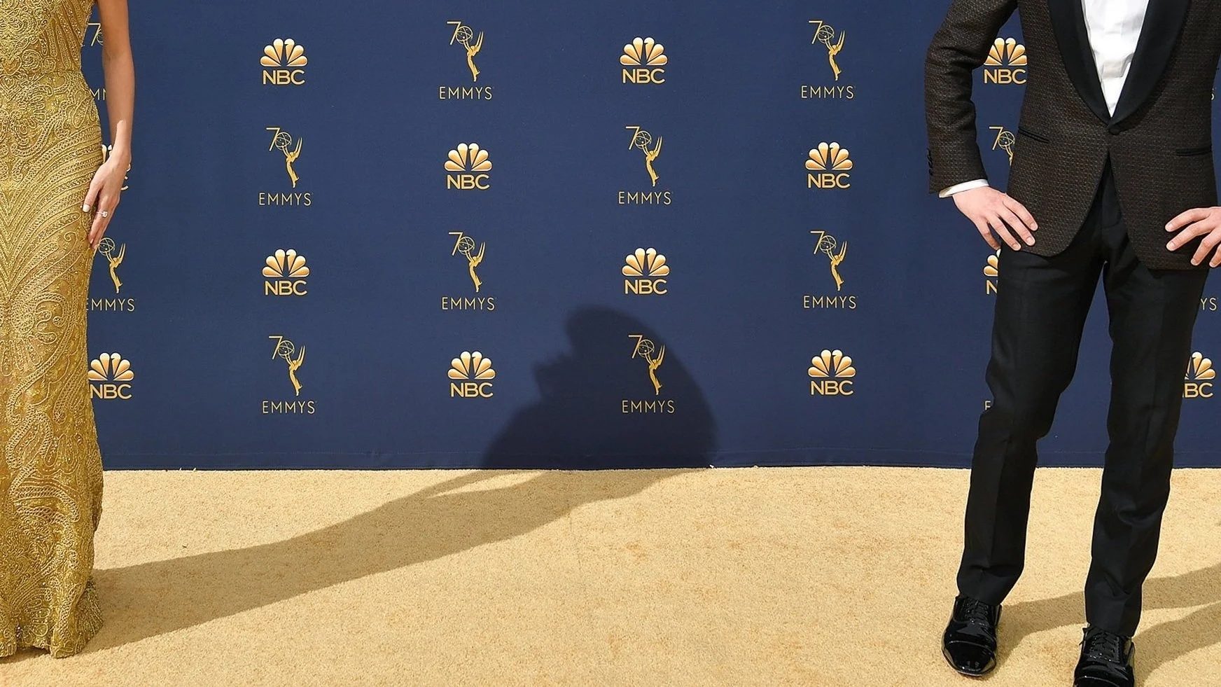 Emmy Awards red carpet, blue step and repeat backdrop